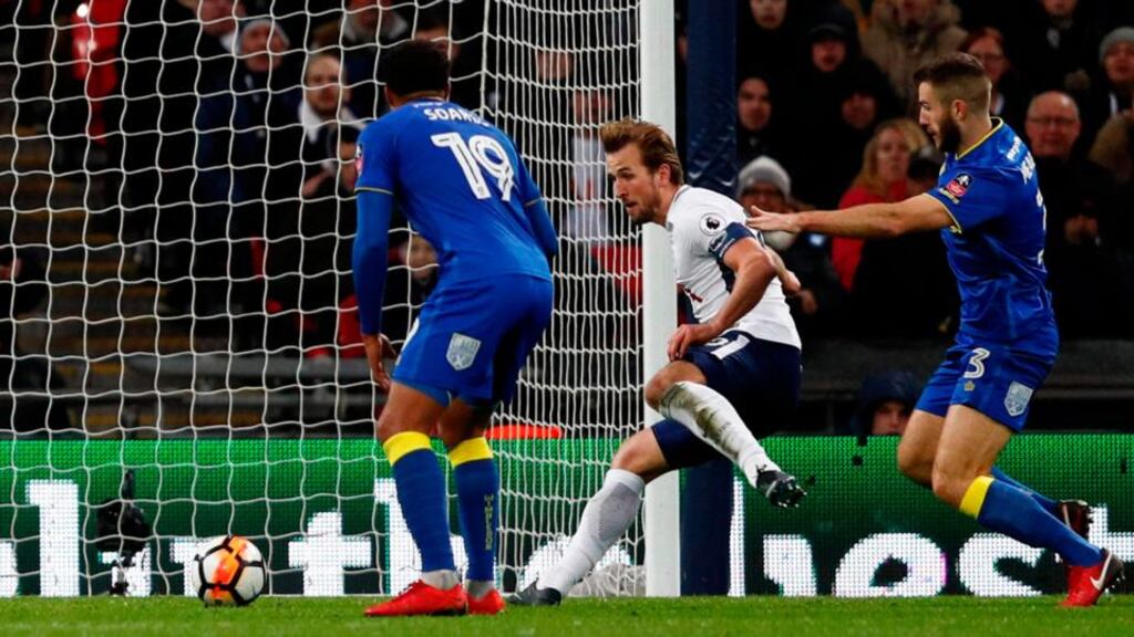 Tottenham Hotspur’s Harry Kane scores their second goal during their FA Cup win over AFC Wimbledon. Photo: Adrian Dennis/Getty Images
