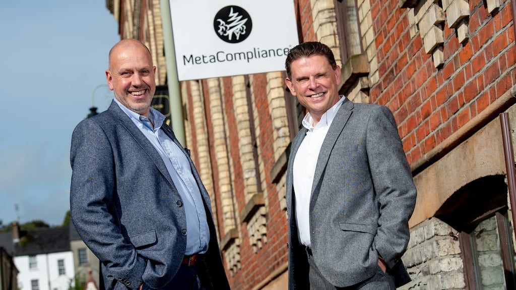 John Hood (left) from Invest Northern Ireland with Robert O’Brien, chief executive of MetaCompliance