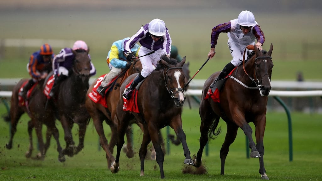 Laurens and Daniel Tudhope hold off Happily to take the Sun Chariot Stakes at Newmarket. Photograph: Tim Goode/PA