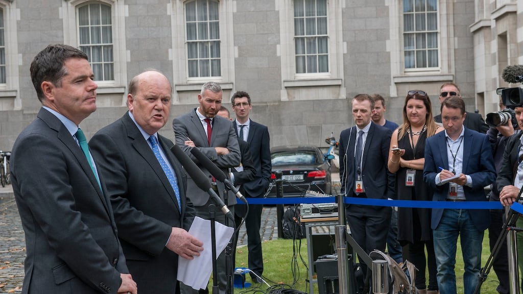 Minister for Public Expenditure and Reform Paschal Donohoe with Minister for Finance Michael Noonan at Government Buildings, announcing that the Cabinet had agreed to appeal the €13 billion Apple tax decision. Photograph: Brenda Fitzsimons/The Irish Times