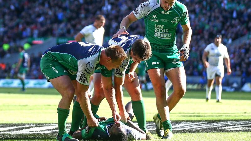 Connacht’s Tom McCartney, AJ MacGinty, Robbie Henshaw celebrate with try scorer Niyi Adeolokun. Photograph: James Crombie/Inpho