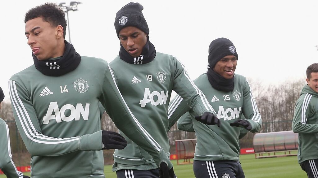 Jesse Lingard, Marcus Rashford and Antonio Valencia of Manchester United in training. Photograph: John Peters/Man Utd via Getty Images