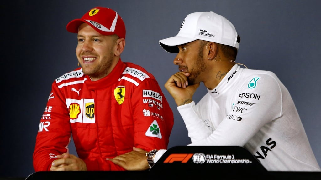 Lewis Hamilton and Sebatian Vettel during the post-qualifying press conference at the Melbourne Grand Prix. Photograph:  Brandon Malone/Reuters