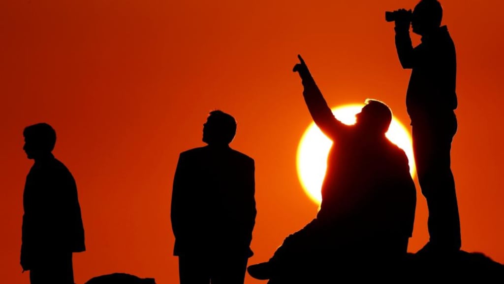 Turkish Kurds watch the Syrian town of Kobani from the Turkish-Syrian border in the southeastern town of Suruc in Sanliurfa province at the weekend. Photograph: Kai Pfaffenbach/Reuters