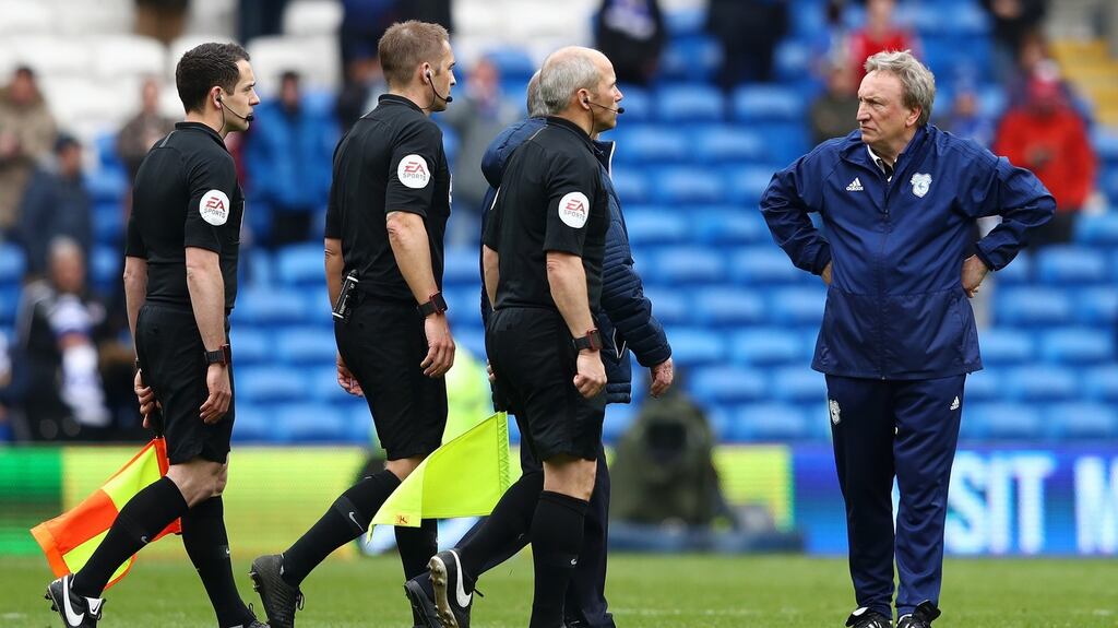 Neil Warnock, manager of Cardiff City, looks at match referee Craig Pawson after the final whistle during the Premier League defeat to Chelsea. Photo: Michael Steele/Getty Images