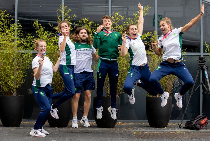 Ireland's rowing medallists from the 2021 Olympic Games on their arrival at Dublin Airport. From left: Emily Hegarty, Fiona Murtagh, Paul O'Donovan, Fintan McCarthy, Aifric Keogh and Eimear Lambe. Photograph: Tom Honan for The Irish Times