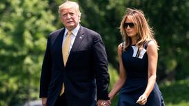 Trump returns from Japan to barrage of criticism