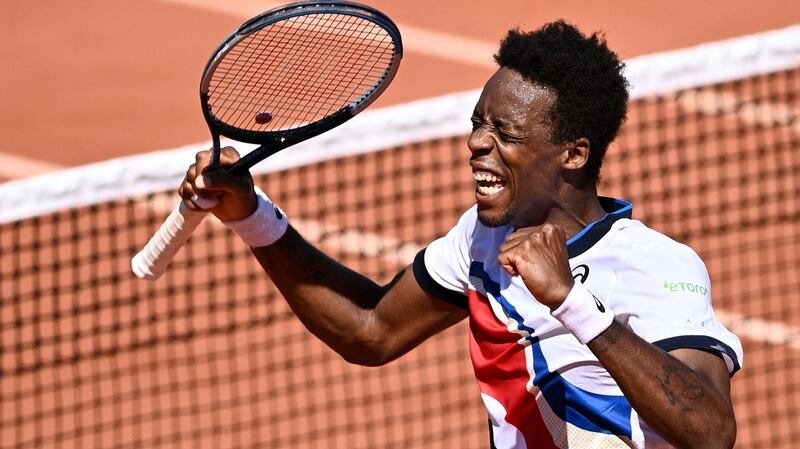 France’s Gael Monfils celebrates after winning against Spain’s Albert Ramos-Vinolas. Photograph: Anne-Christine Poujoulat/AFP via Getty Images