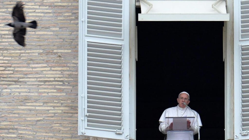 Pope Francis addresses the faithful as a pigeon flies by during the Angelus prayer at Saint Peter’s Square in the Vatican on Sunday. The Vatican has refused to provide a United Nations rights panel with information on the Church’s internal investigations into the sexual abuse of children by clergy, saying that its policy was to keep such cases confidential. Photograph: Ettore Ferrari/EPA