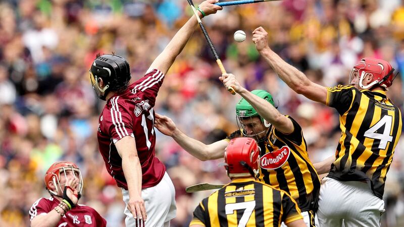 Galway’s Joseph Cooney in action against Kilkenny’s Robert Lennon and Joey Holden during the 2016 Leinster hurling final. Photograph: Ryan Byrne/Inpho