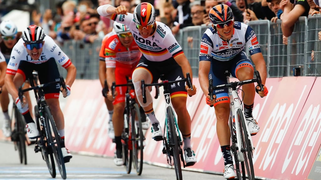 Team Nippo Vini Fantini Faizane’ Italian rider Damiano Cima jubilates as he finishes first in the 18th stage of the 2019 Giro d’Italia in Santa Maria di Sala. Photograph: Luk Benies/AFP/Getty