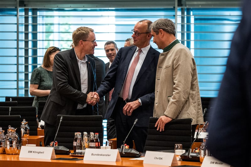 State premier of Schleswig-Holstein Daniel Günther (left) with German chancellor Friedrich Merz at a meeting of state premiers last June. Photograph: Nadja Wohlleben/Getty Images
