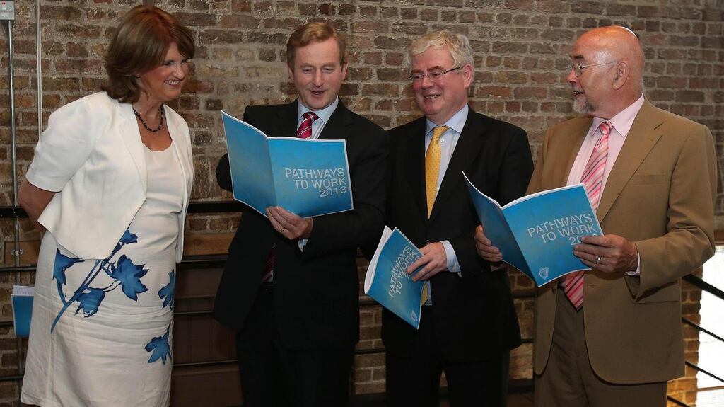 Minister for Social Protection Joan Burton, Taoiseach Enda Kenny ,Tánaiste Eamon Gilmore and Education Minister Ruairi Quinn at the Digital Hub in Dublin at the launch of the Pathways to work scheme. Photograph: PA