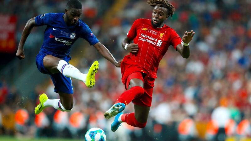 Fikayo Tomori Divock Origi battle for the ball. Photo: Adam Davy/PA Wire