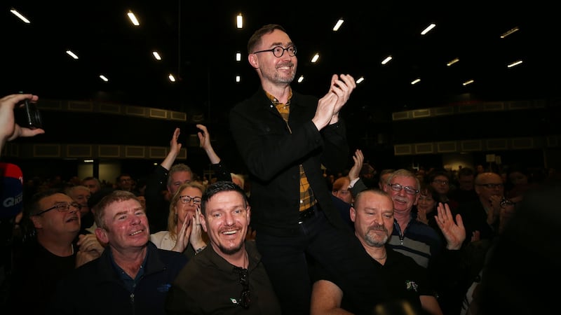 Sinn Féin’s Eoin Ó Broin celebrating with colleagues and family after being elected in Dublin Mid West. Carrying him aloft, to his left, is fellow candidate Mark Ward, who has also been elected in the constituency. Photograph: Nick Bradshaw