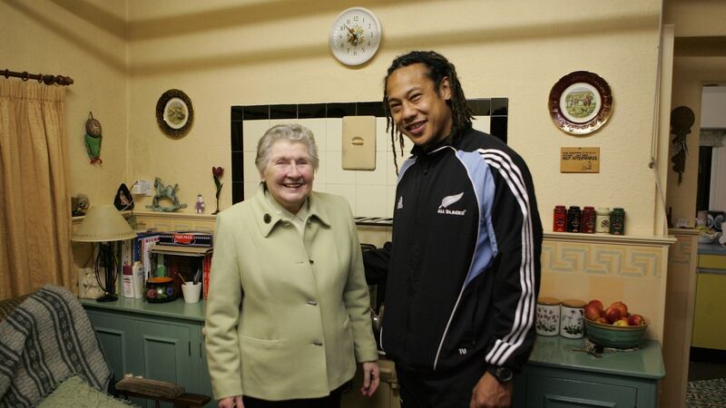 All Black captain Tana Umaga stands in the kitchen of the home where 1905 All Black captain Dave Gallager was born with present home owner Ena Corry on November 9th, 2005 in Ramelton, Donegal, Ireland. Photo: Ross Land/Getty Images