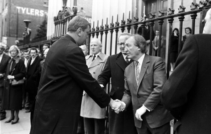 Businessman Ben Dunne of Dunnes Stores shakes hands with Fianna Fáil Leader Charles Haughey at St Mary's Pro Cathedral Dublin in 1986. Photograph: Eamonn Farrell/RollingNews.ie