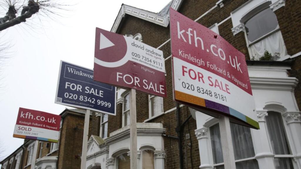 For sale signs displayed outside UK houses. Photograph: Yui Mok/PA Wire