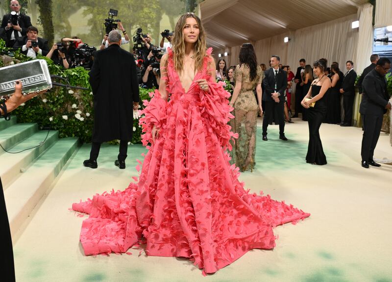 Jessica Biel wore a bright pink feathered gown. Photograph: Angela Weiss/AFP via Getty Images
