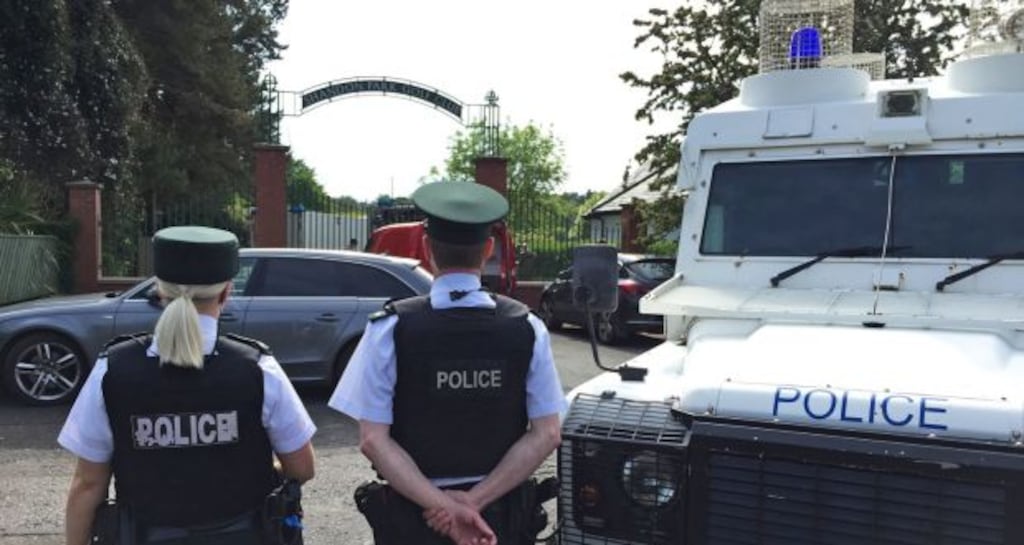 Police and army bomb disposal experts at Shandon Park Golf Club in east Belfast where they examined a suspect device under a police officer’s car in the car park. Photograph: David Young/PA Wire