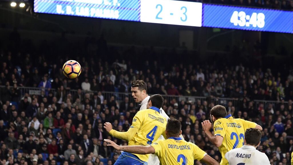Ronaldo powers home a header to make it 3-3 in the La Liga game against Las Palmas at the Santiago Bernabeu stadium. Photograph: Javier Soriano/AFP/Getty Images