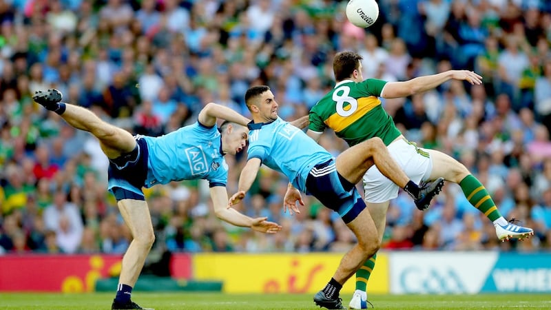 Dublin’s James McCarthy and Brian Fenton with David Moran of Kerry. Photograph: James Crombie/Inpho