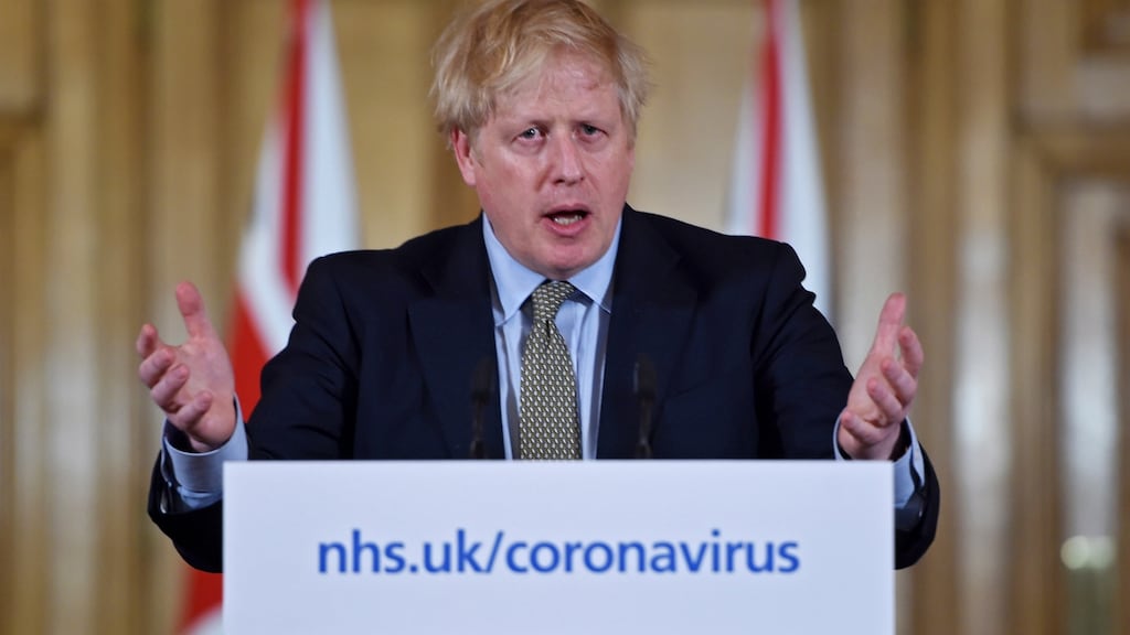 Britain’s prime minister Boris Johnson during a news conference in No 10 Downing Street. He said schools would close from Friday onwards. Photograph: EPA/Eddie Mullholland