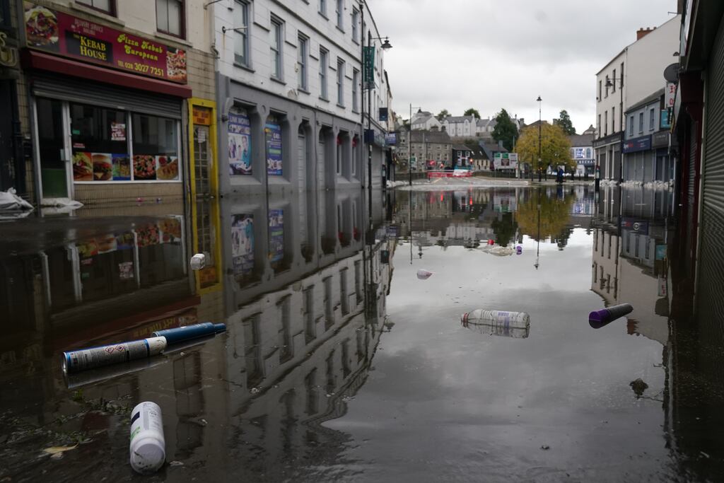 A view of debris and flood water in Newry, Co Down, on Wednesday, after the centre of the town was swamped by floodwater. Dozens of businesses were flooded. Photograph: Brian Lawless/PA