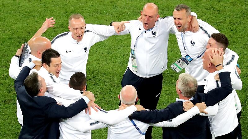 Didie Deschamps and his France coaching staff celebrate after France’s 1-0 win over Belgium. Photograph: Zurab Kurtsikidze/EPA