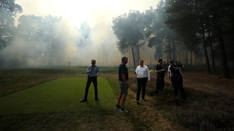 Police and event staff at Wentworth Golf Club on Friday. Photograph: Getty Images