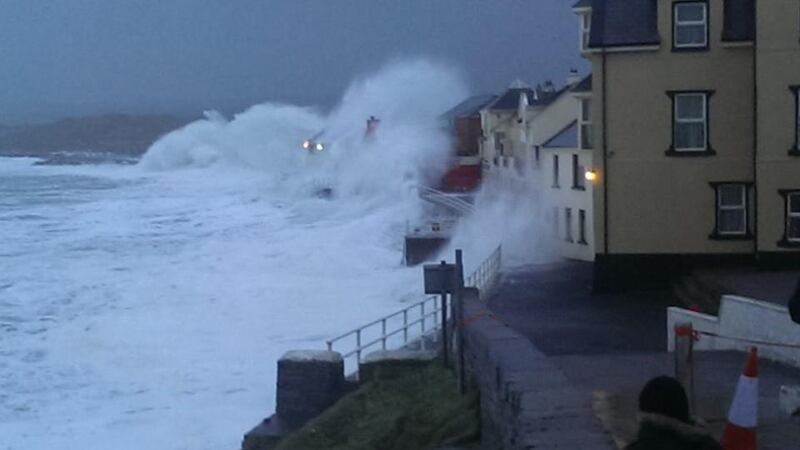 Waves crash into Lahinch Promenade in Co Clare this morning. Photograph: Cliodhna Fawl/Lahinch Surf Shop