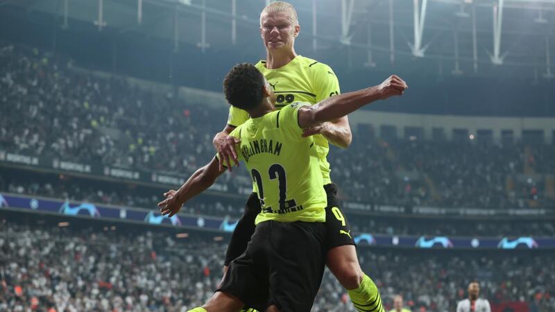 Erling Haaland celebrates with of Borussia Dortmund team-mate Jude Bellingham after scoring their second goal during the Champions League Group C match against Besiktas at Vodafone Park in Istanbul, Turkey. Photograph: Alex Grimm/Getty Images