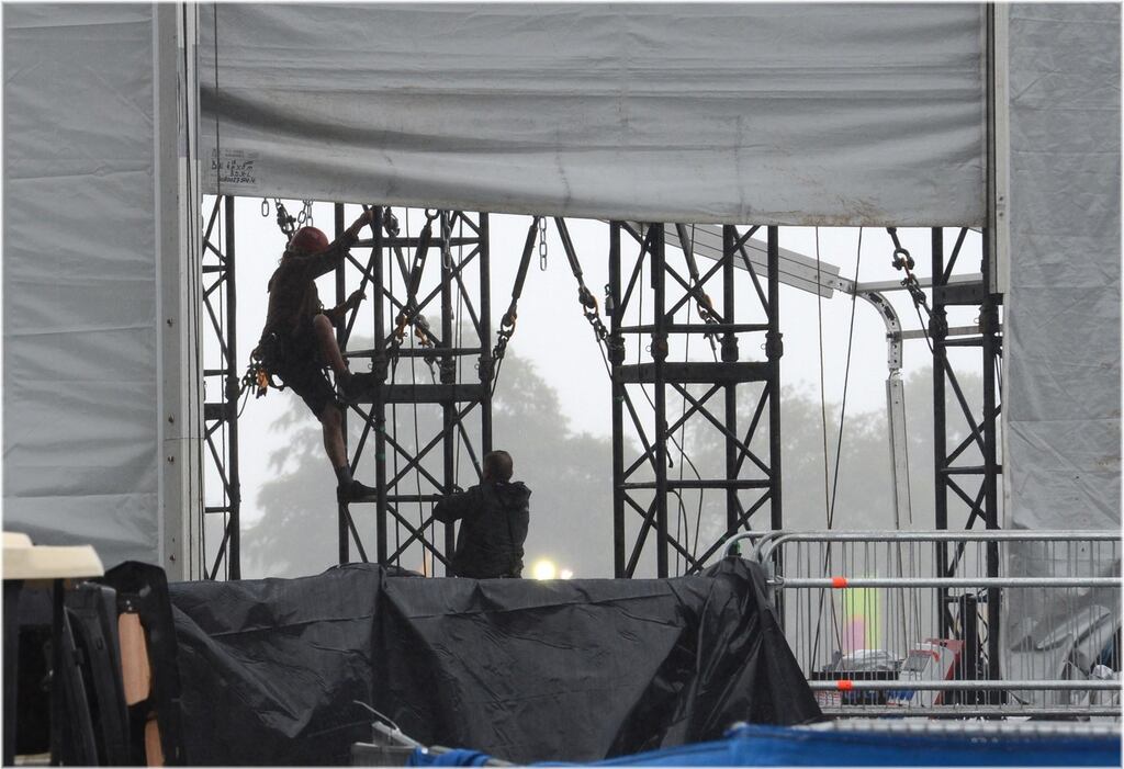 Workers take down the stage after the Swedish House Mafia concert in the Phoenix Park. Photograph: Dara Mac Dónaill