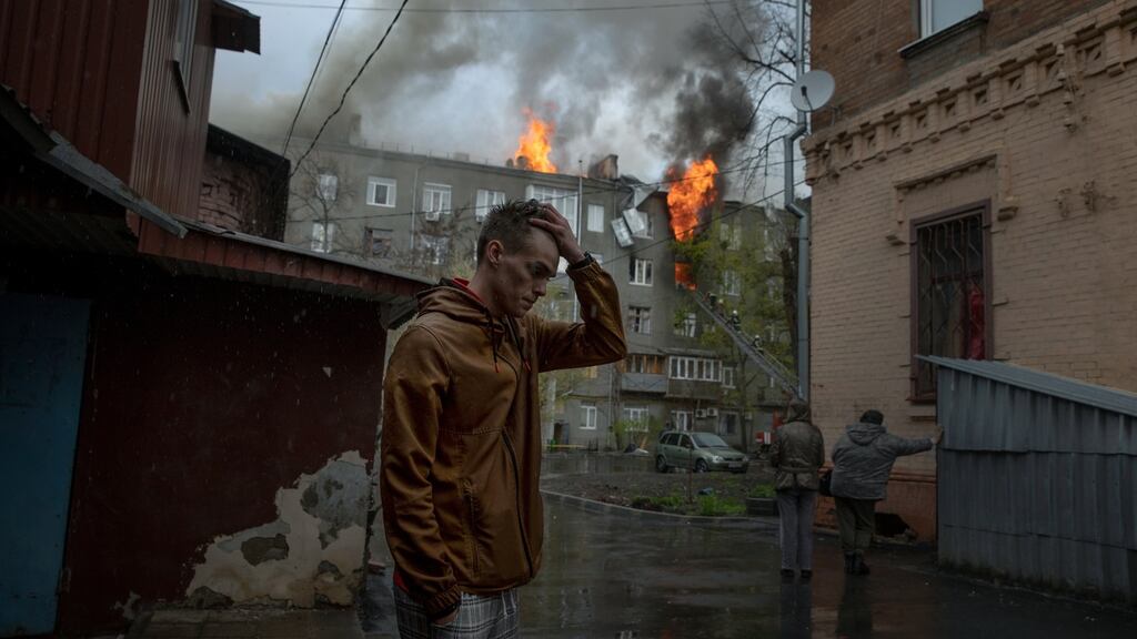 An apartment building in flames after a rocket barrage that struck central Kharkiv on Sunday. Photograph: Tyler Hicks/New York Times
