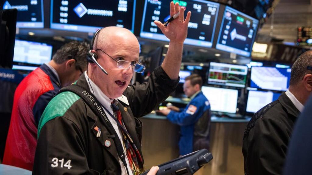 NYSE traders: Evidence is mounting that many high-fee funds that purport to be active are just closet index trackers. Photograph: Andrew Burton/Getty Images