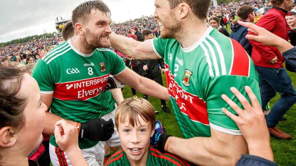Mayo’s Aidan O’Shea and Chris Barrett celebrate after the victory over Mayo in Castlebar. Photograph: James Crombie/Inpho