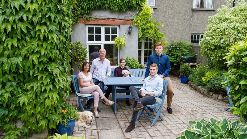 Karl Jordan and his wife Carolyn Moore with their sons (from left) Robert, Christopher and Daniel, at their home in Dún Laoghaire Co Dublin. Photograph: Karl Jordan