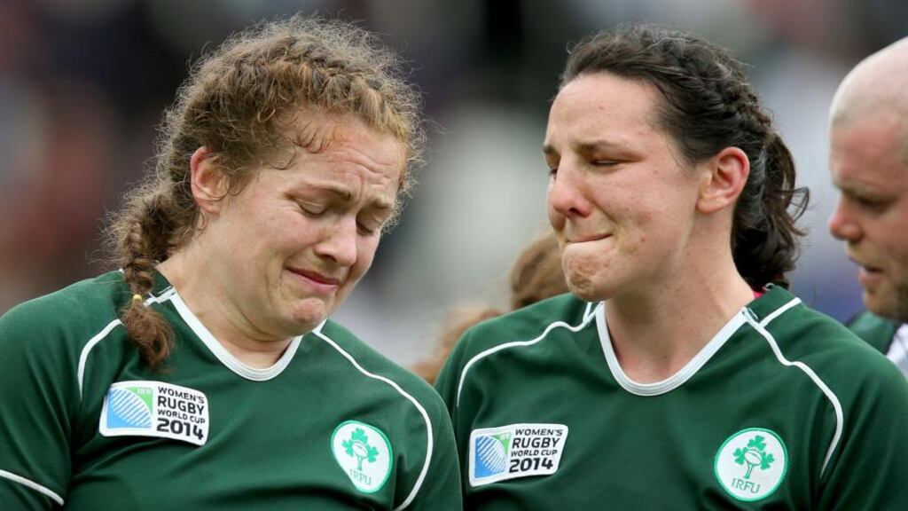 Ireland captain Fiona Coghlan with  Paula Fitzpatrick after yesterday’s 25-18 loss to France in Paris. Photograph: Dan Sheridan/Inpho.