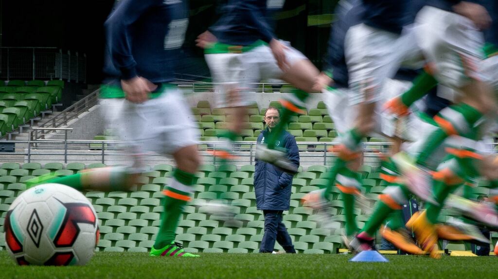 Irish manager Martin O’Neill watches his team train ahead of tonight’s friendly. Photograph: Morgan Treacy/Inpho
