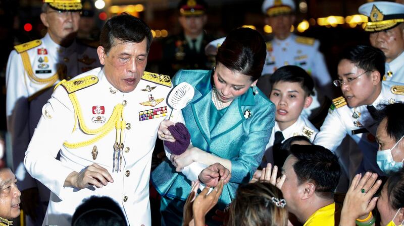 Thai King Maha Vajiralongkorn Bodindradebayavarangkun (left) and Queen Suthida (right) greet well-wishers during a royal ceremony to commemorate the death anniversary of King Vajiravudh, or King Rama VI, at Lumpini Park in Bangkok on November 25th. Photograph: Rungroj Yongrit/EPA