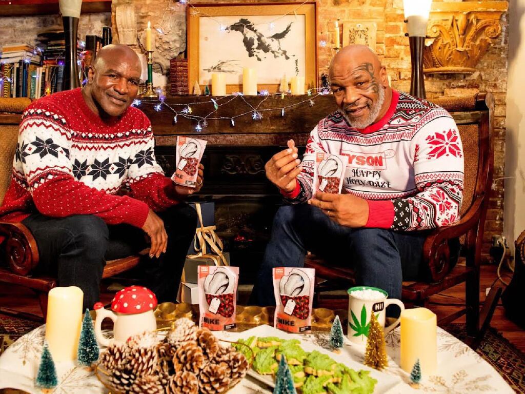 Mike Tyson and Evander Holyfield in a commercial for Tyson's new range of cannabinoid edibles baked in the shape of an ear. Geddit?