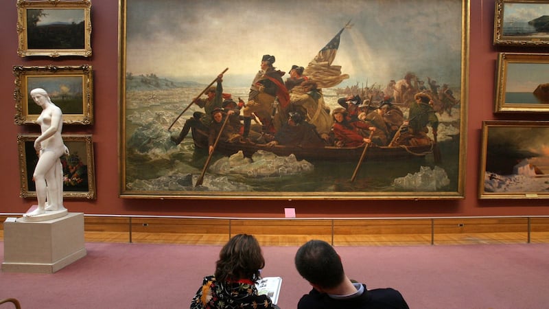 A pair admires “Washington Crossing the Delaware” at the Metropolitan Museum of Art in New York. Photograph: Todd Heisler/The New York Times