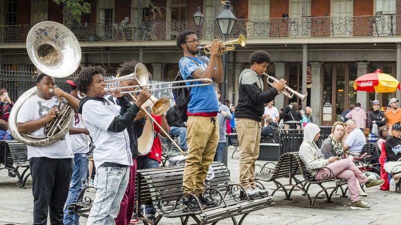 A group of young men play jazz music in the French quarter of New Orleans. Photograph: iStock