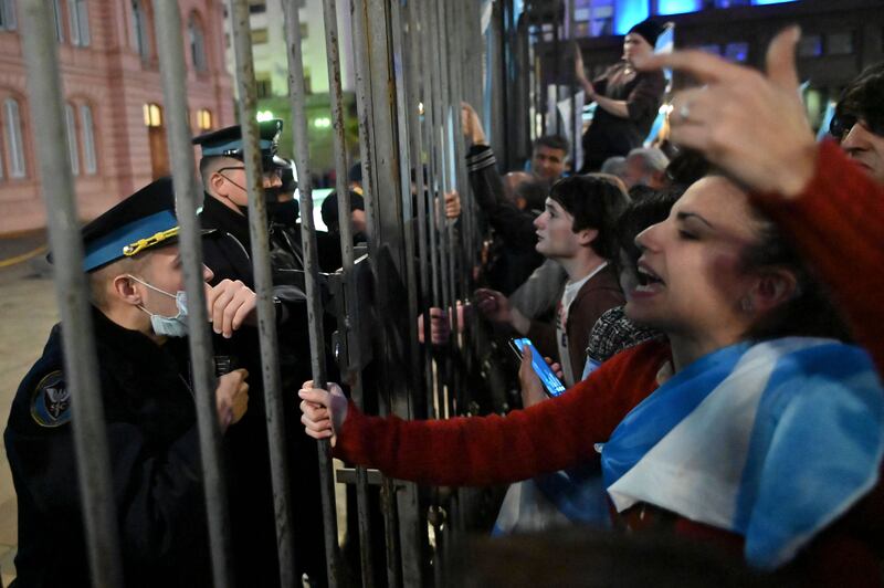 Opponents of the government of Argentina's president Alberto Fernández hold a protest outside Casa Rosada presidential palace in Buenos Aires. Photograph: Luis Robayo/AFP via Getty Images