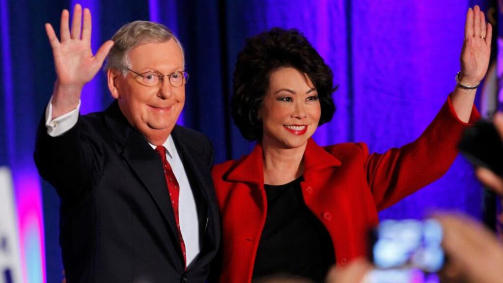 Mitch McConnell with his wife, former US secretary of labour Elaine Chao, at his midterm election night rally in Louisville, Kentucky, on Tuesday. Photograph: John Sommers II/Reuters