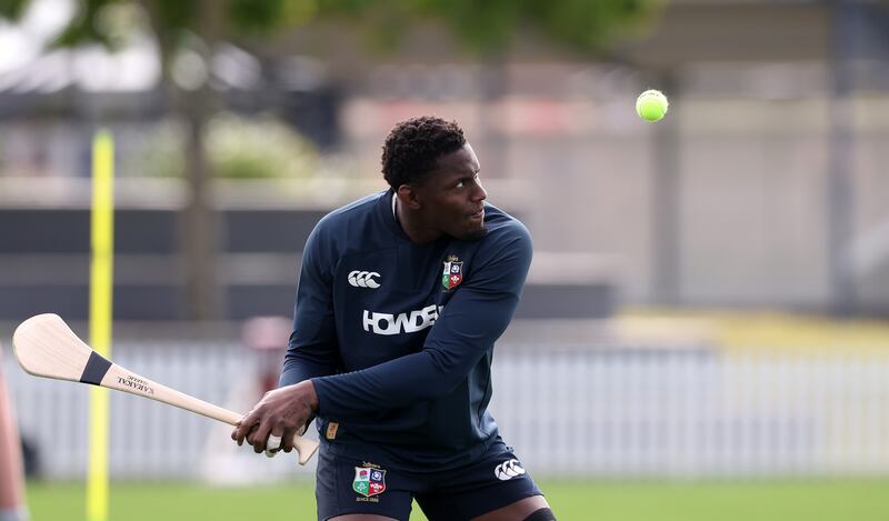 Maro Itoje tries his hand at hurling during a Lions training session at Churchie School in Brisbane. Photograph: David Rogers/Getty Images