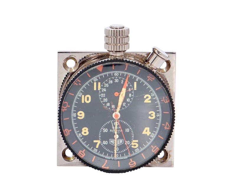 A rare stainless steel and aluminium manual wind dashboard mounted chronograph stopwatch that was owned by the late rally driver John McClean (£3,000-£5,000)