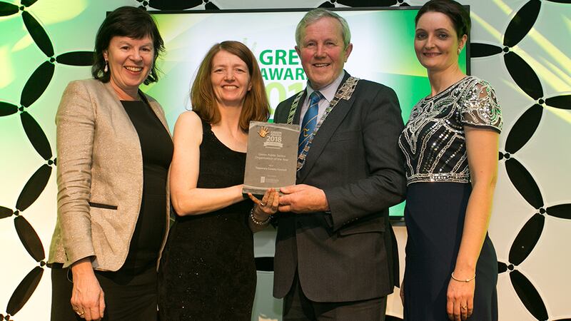 Bernie Kiely, Assistant Principal in the Waste and Resource Efficiency Division, Department of Communications, Climate Action & Environment, presents the Green Public-Sector Organisation of the Year award to Marion O’Neill, Roger Kennedy & Paula Gallagher, Tipperary County Council.