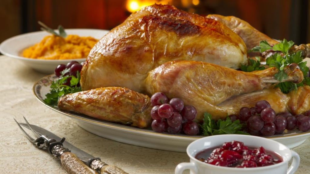 A typical Thanksgiving meal, including roast turkey, cranberry sauce and pumpkin