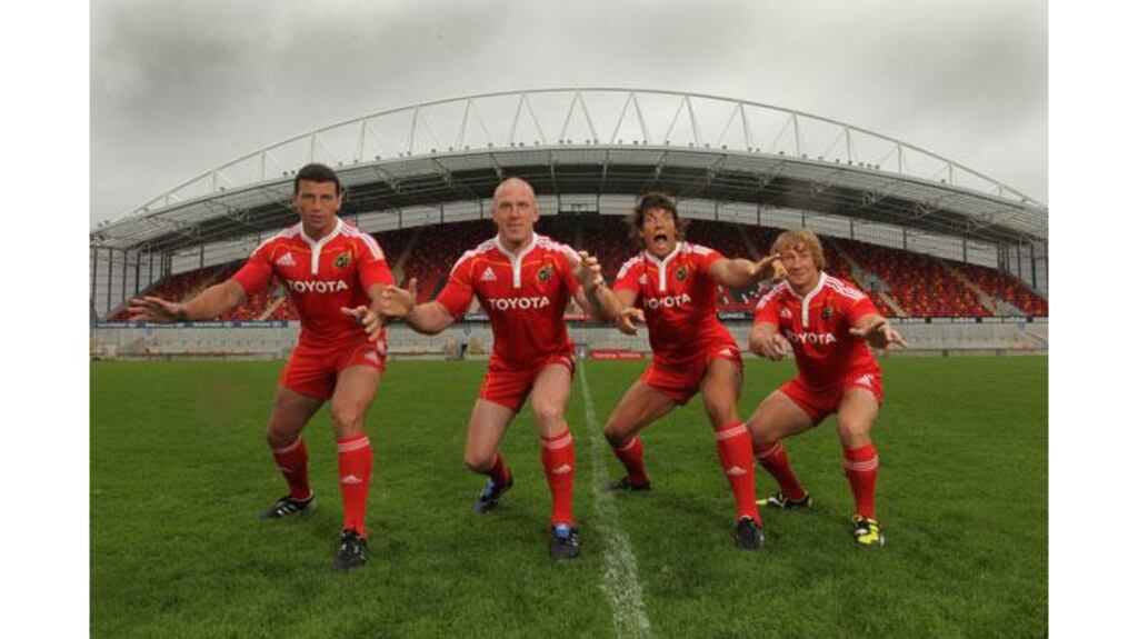 Denis Leamy, Paul O'Connell, Donncha O'Callaghan and Jerry Flannery in a mock Haka pose in their Munster kit at Thomond Park. - (Photograph: Billy Stickland/Inpho)
